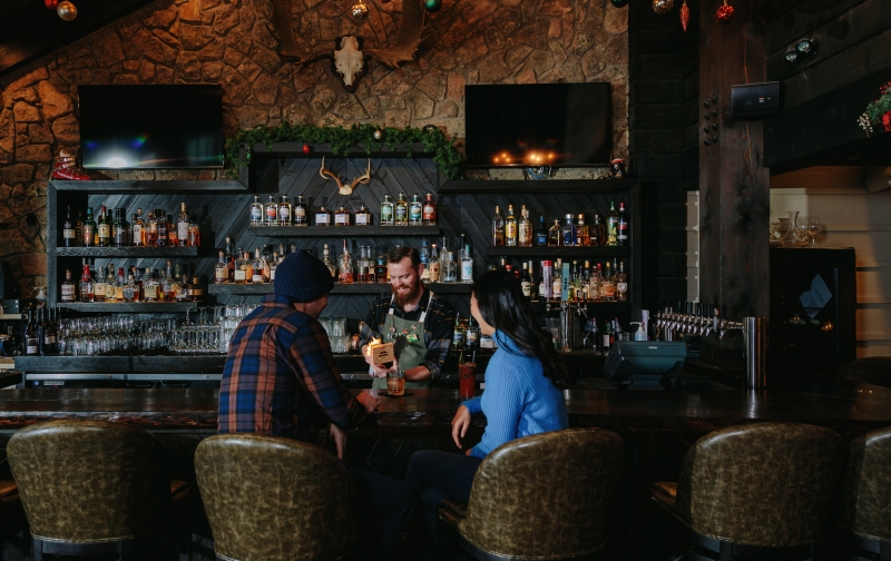 Couple enjoying drinks at Park Distillery