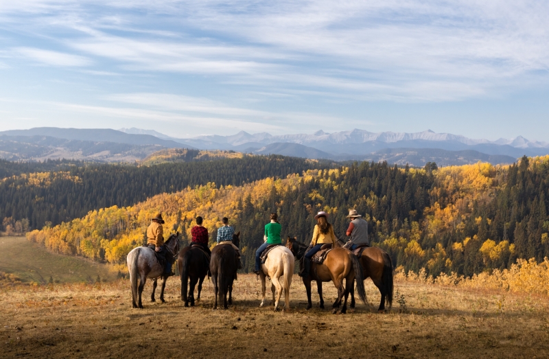 Group of trail riders while visiting Banff in May