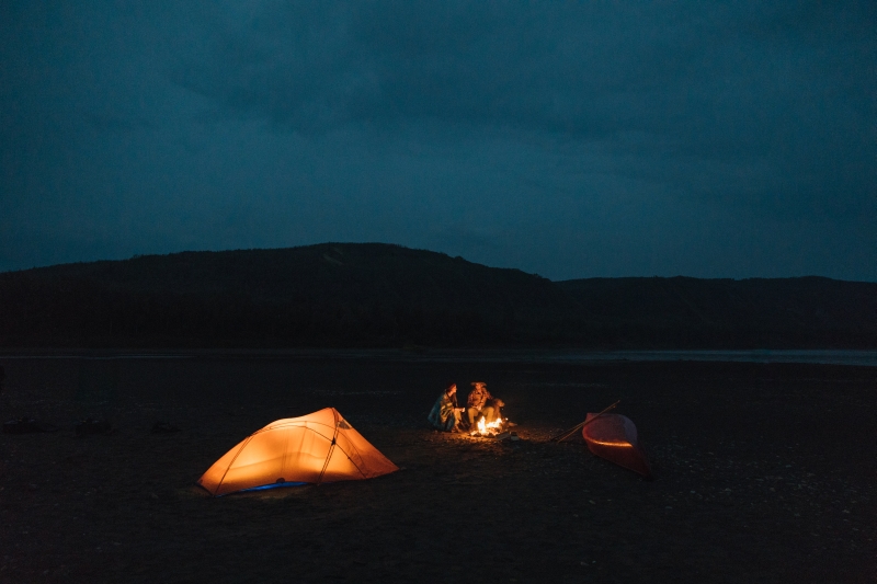 couple camping at night