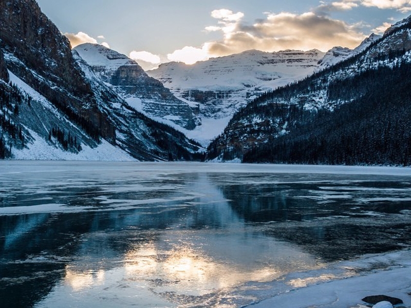 Storm Clouds Build Behind a Slushy Lake Louise, Alberta Stock Photo - Image  of majestic, glacier: 115348288